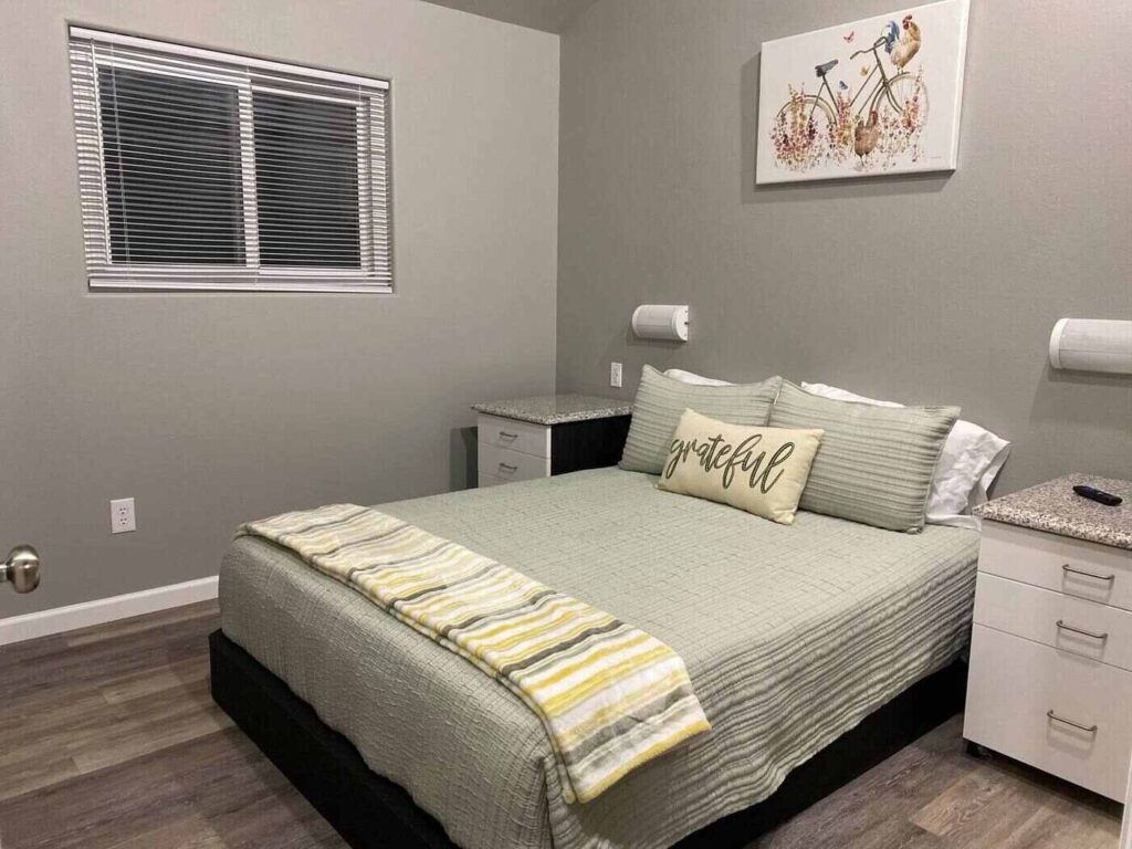cabin master bedroom with queen bed