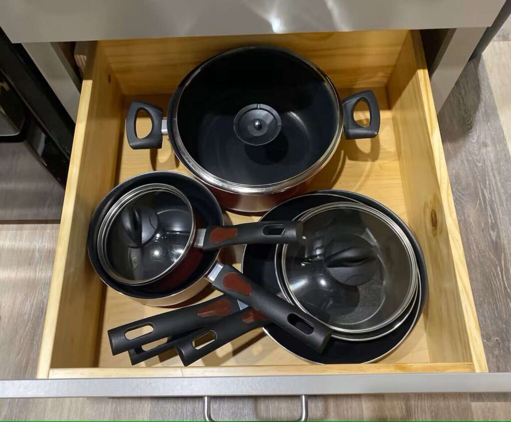 pots and pans in the drawer