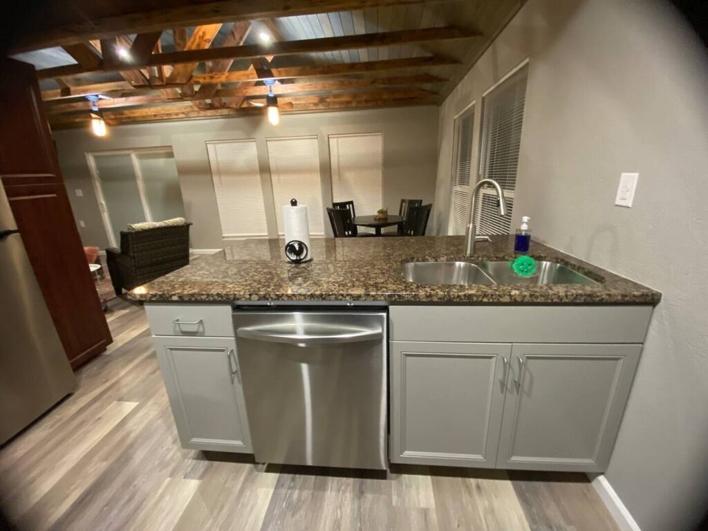kitchen counter with countertops and dishwasher