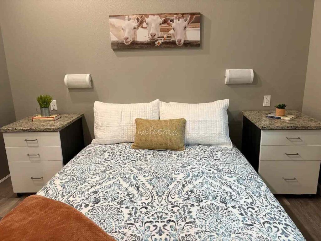 bedding and night stands in the master bedroom